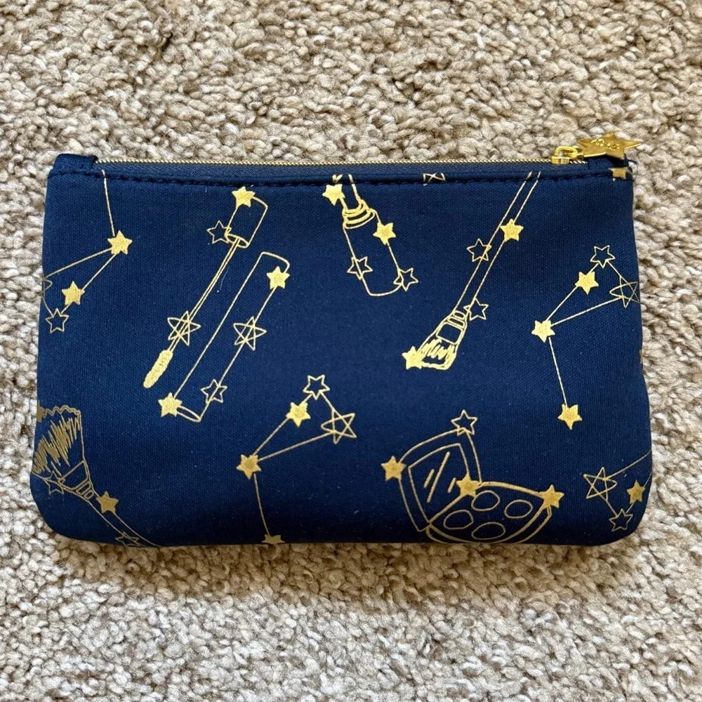 ipsy navy gold